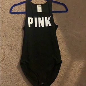 Pink xs/s body suit never worn
